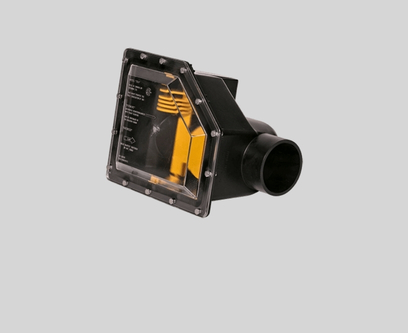 Black plastic mechanical component with a transparent angled cover showing internal yellow parts.
