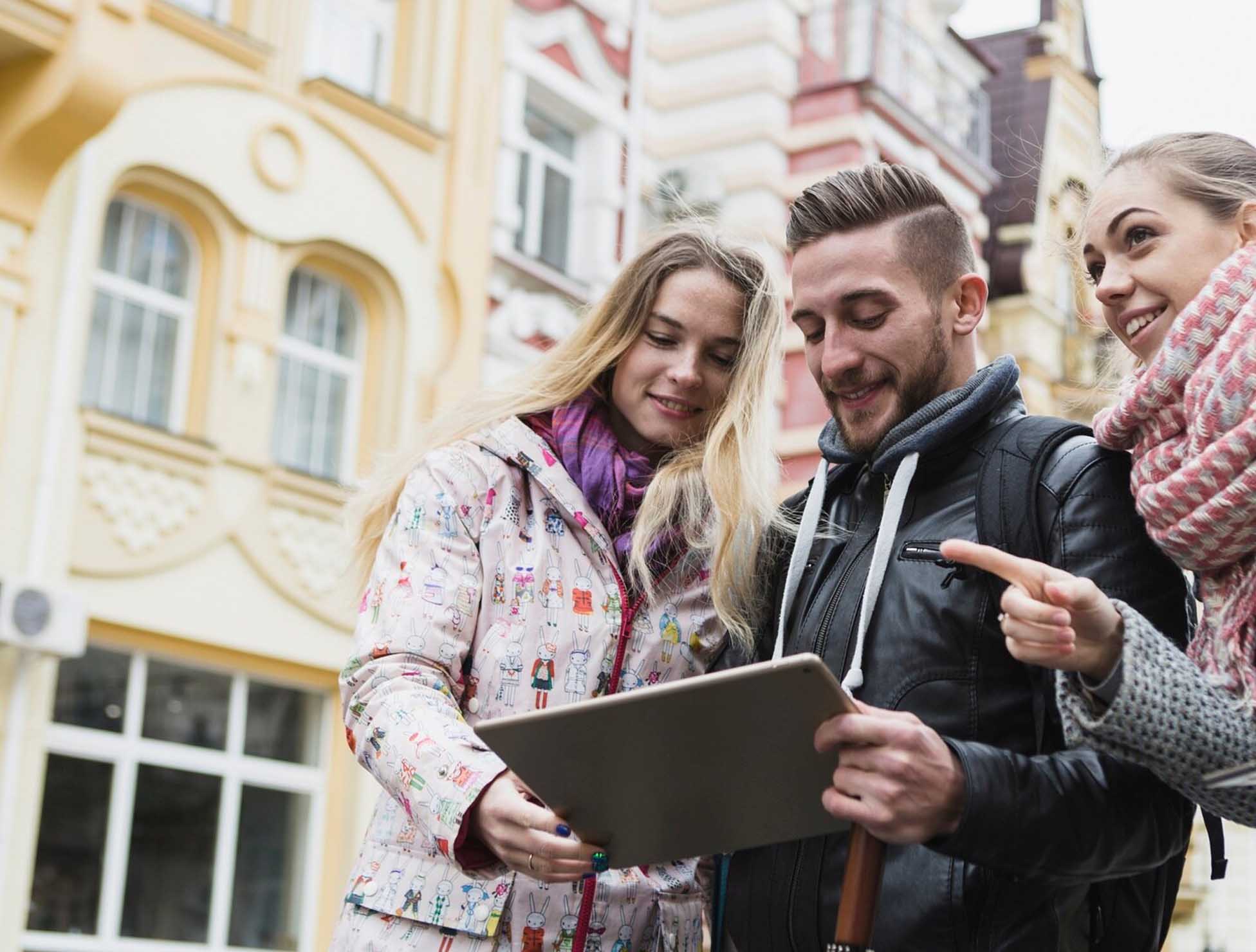 A diverse group of individuals using translation and interpretation services to communicate seamlessly across languages.