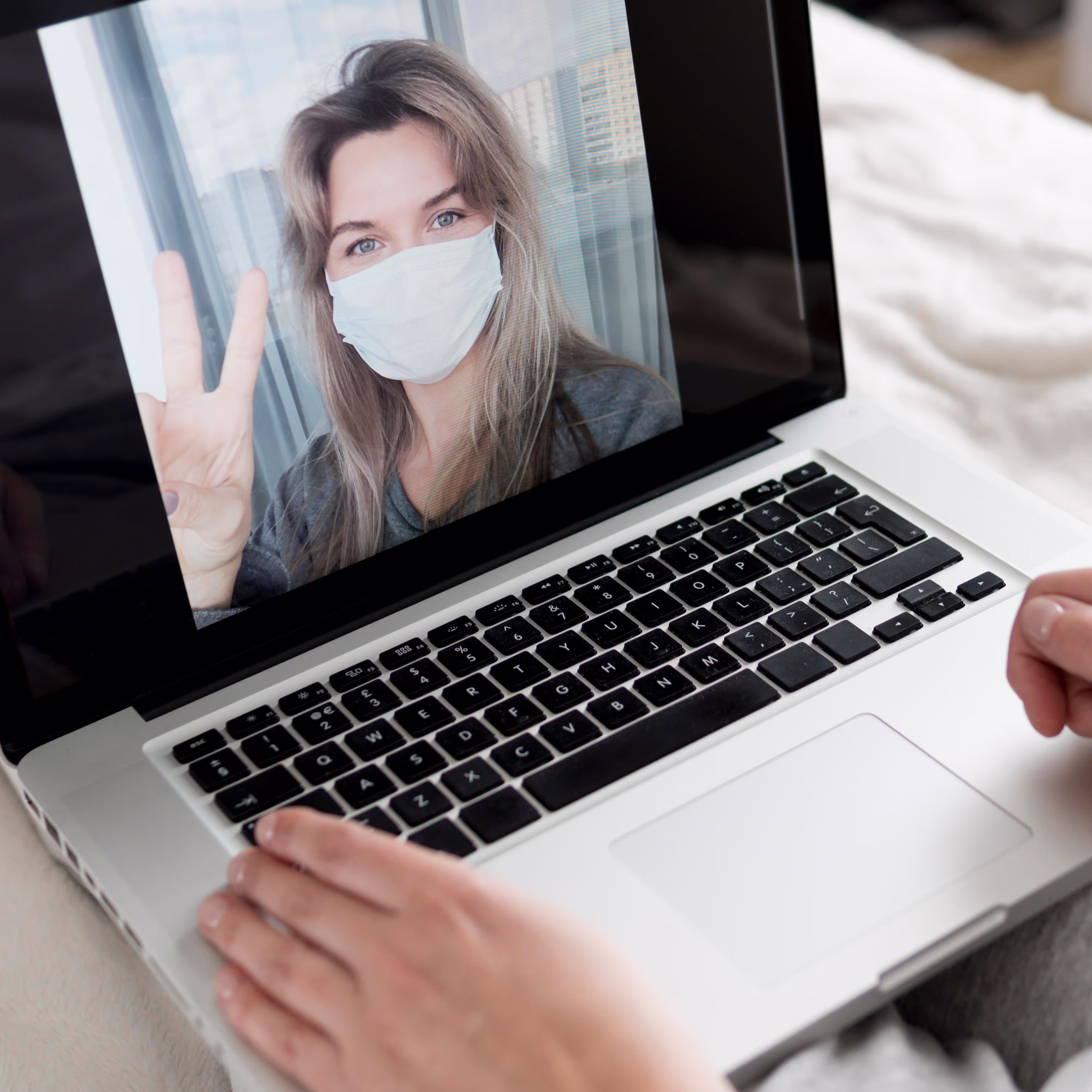 A legal professional using over-the-phone interpretation services to assist a multilingual client in real time.