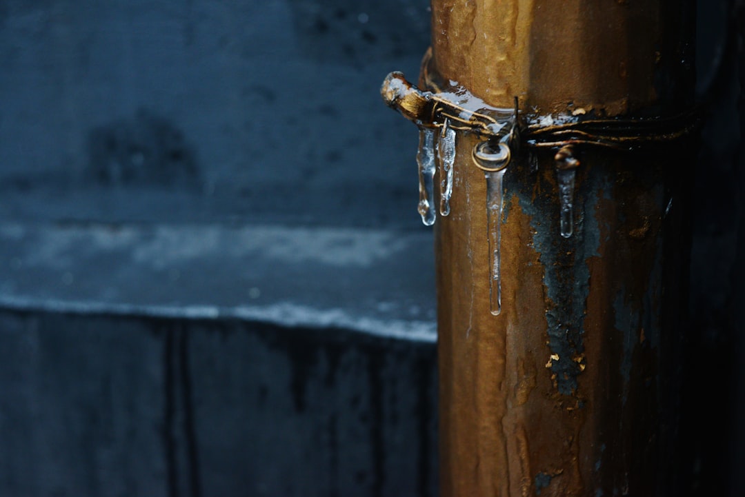 frost forming on copper plumbing pipes during a winter freeze