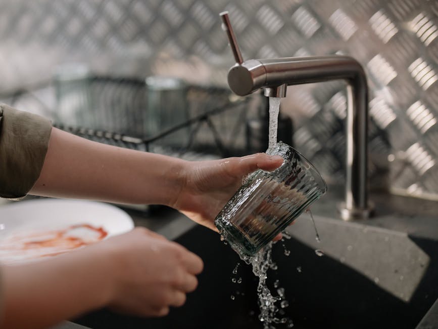 clean kitchen sink with water flowing - drain cleaning folsom