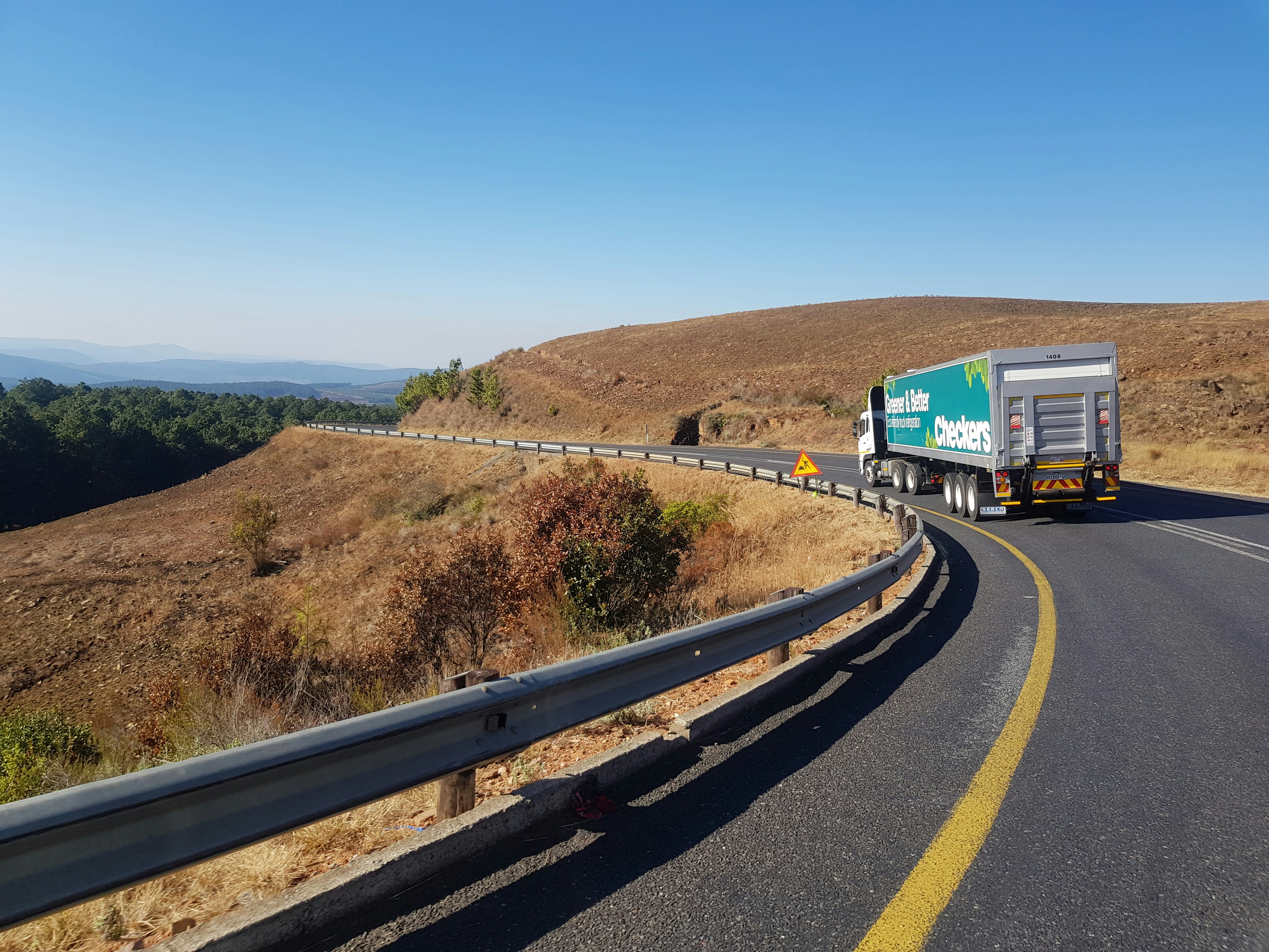Semi truck on the road illustrating captive insurance for transportation and logistics