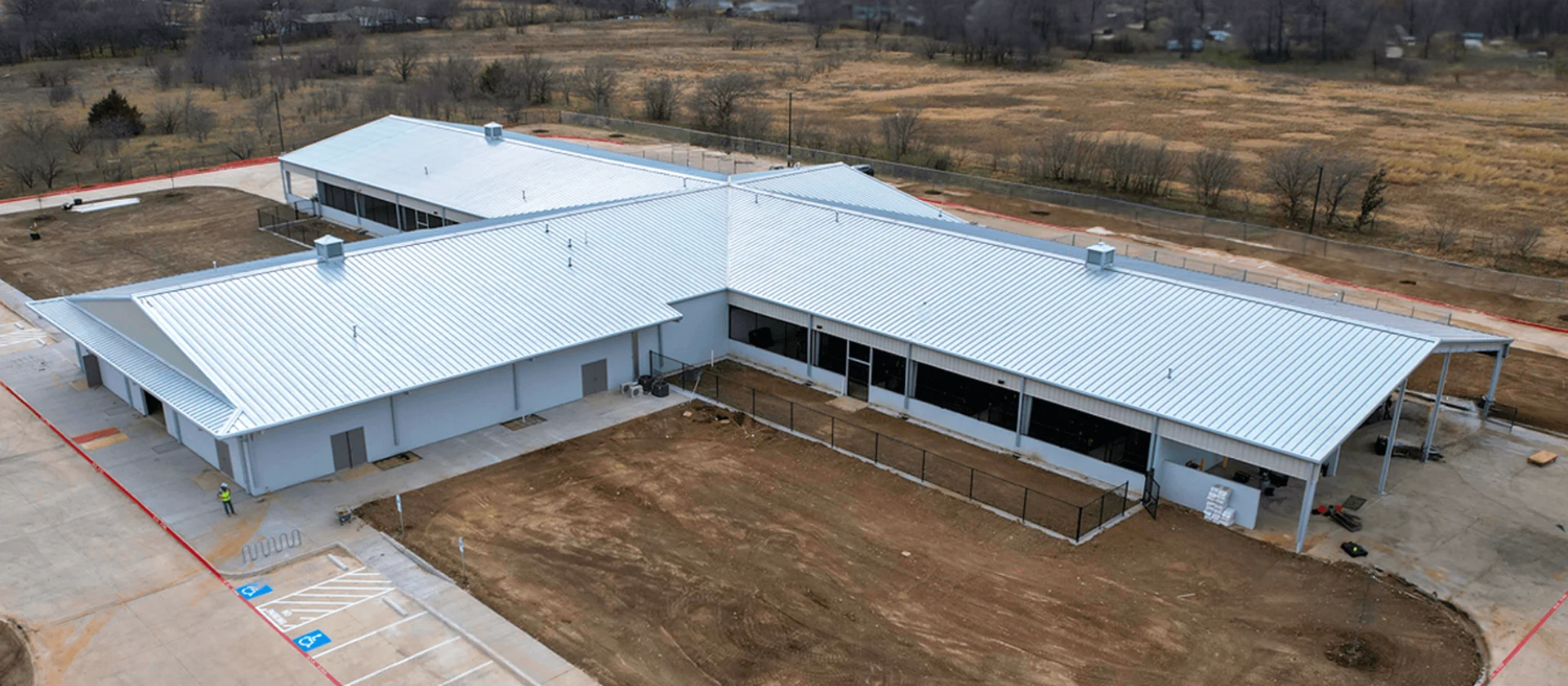 Structural steel construction in pre-engineered metal building