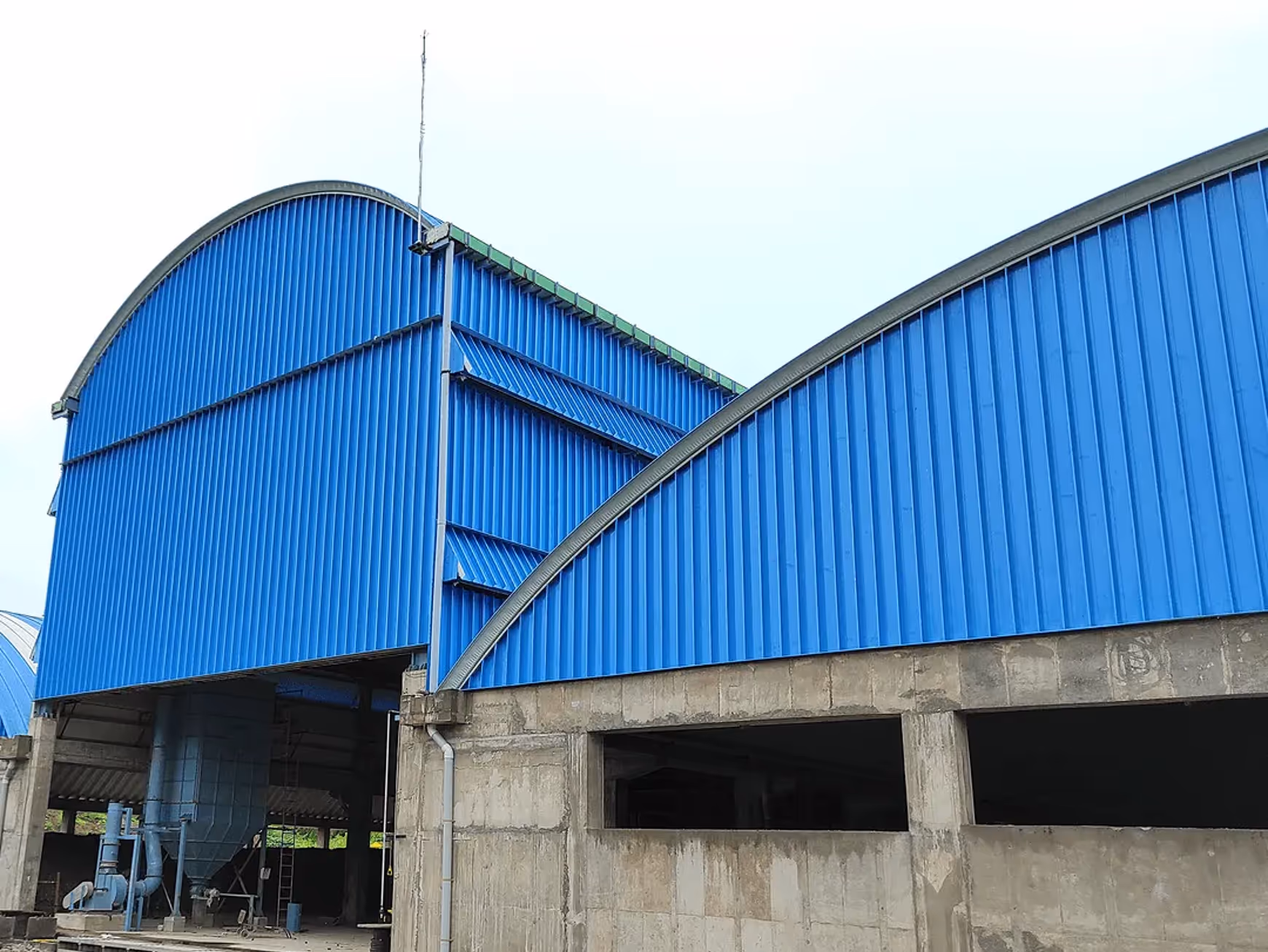 Side and gable wall cladding with corrugated steel by Proflex Systems