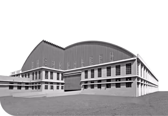 Modern Proflex self-supported steel roofing installed on a red-background warehouse in India.