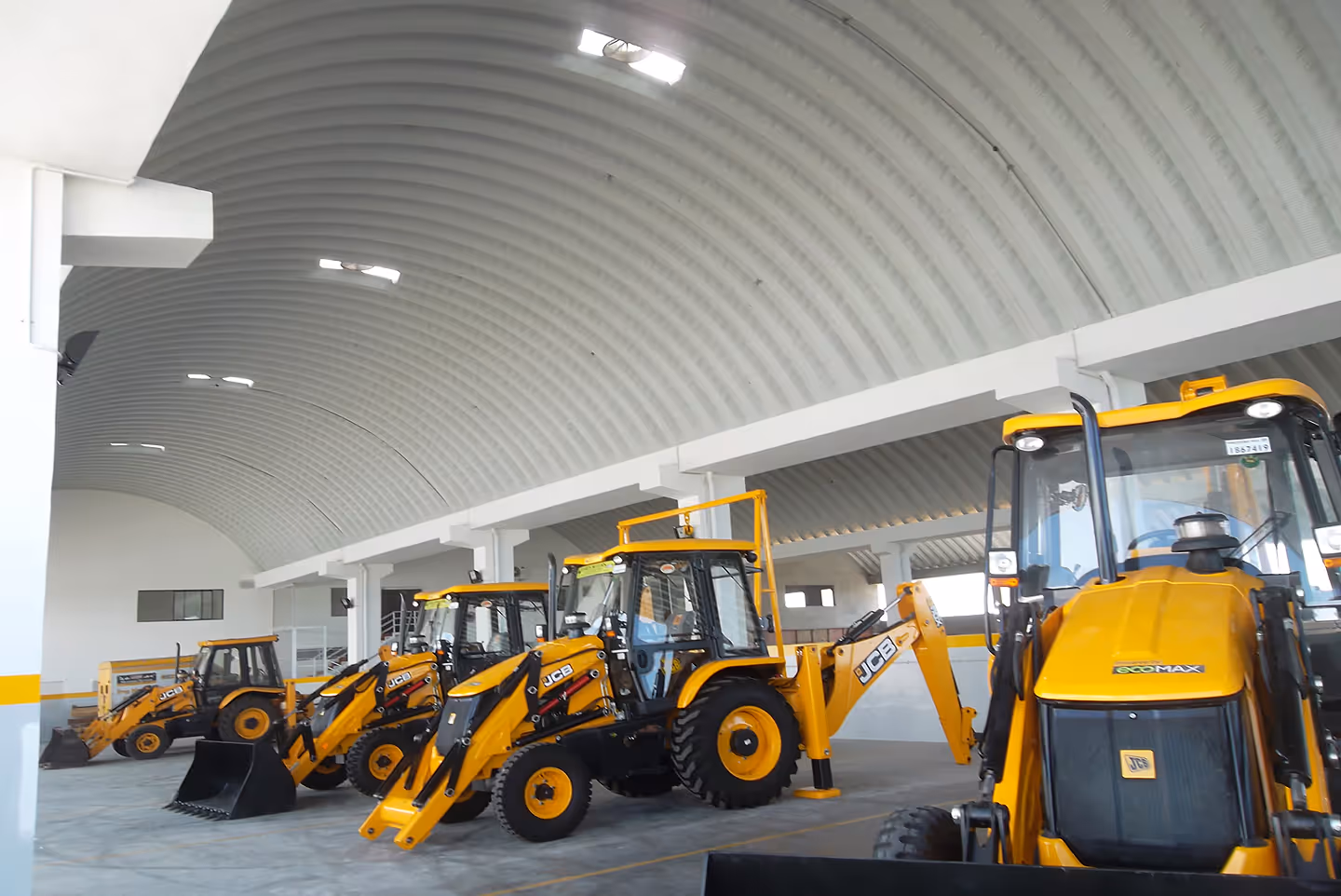 Proflex trussless roofing for automobile facility