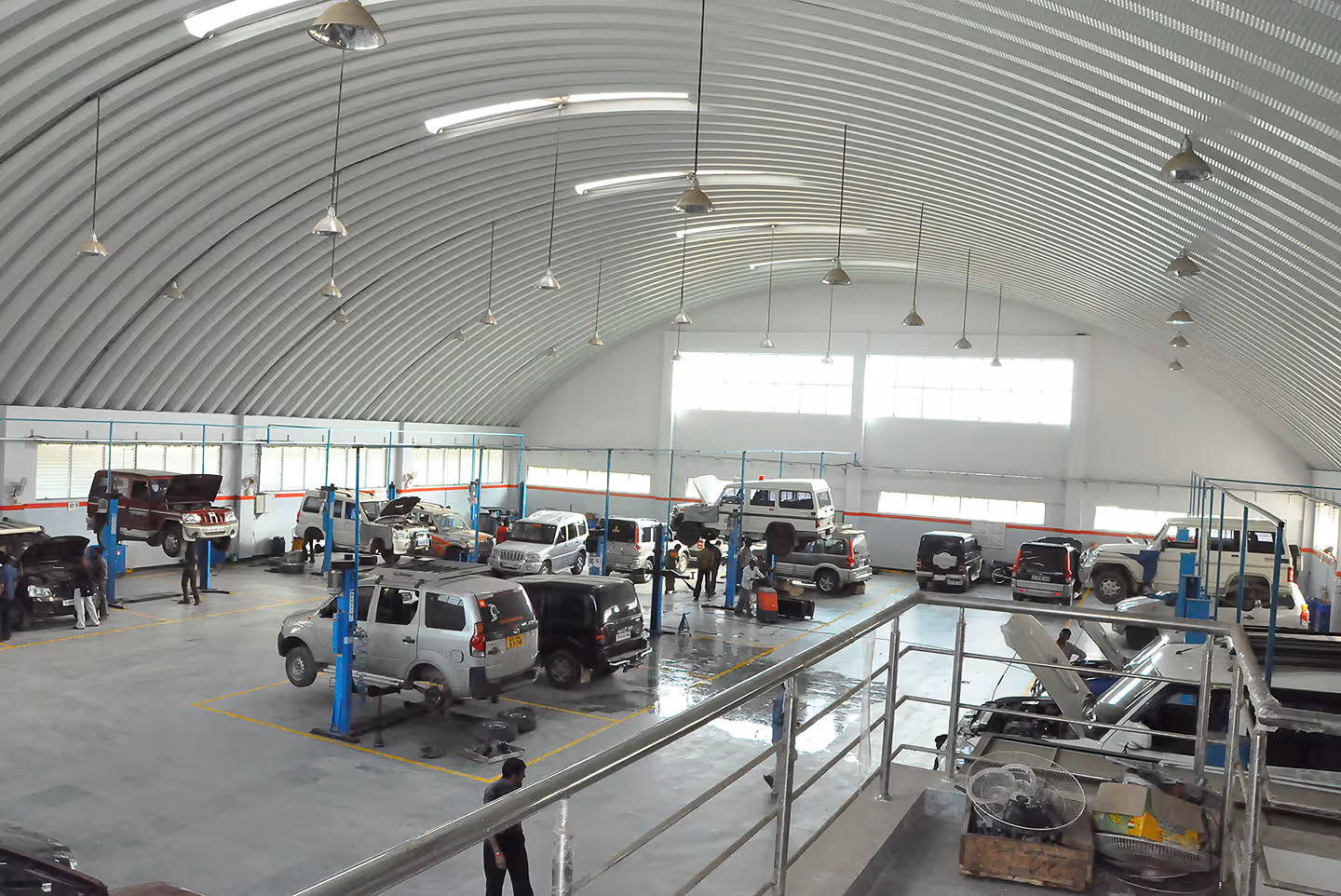 Corrugated steel roofing for automobile workshop
