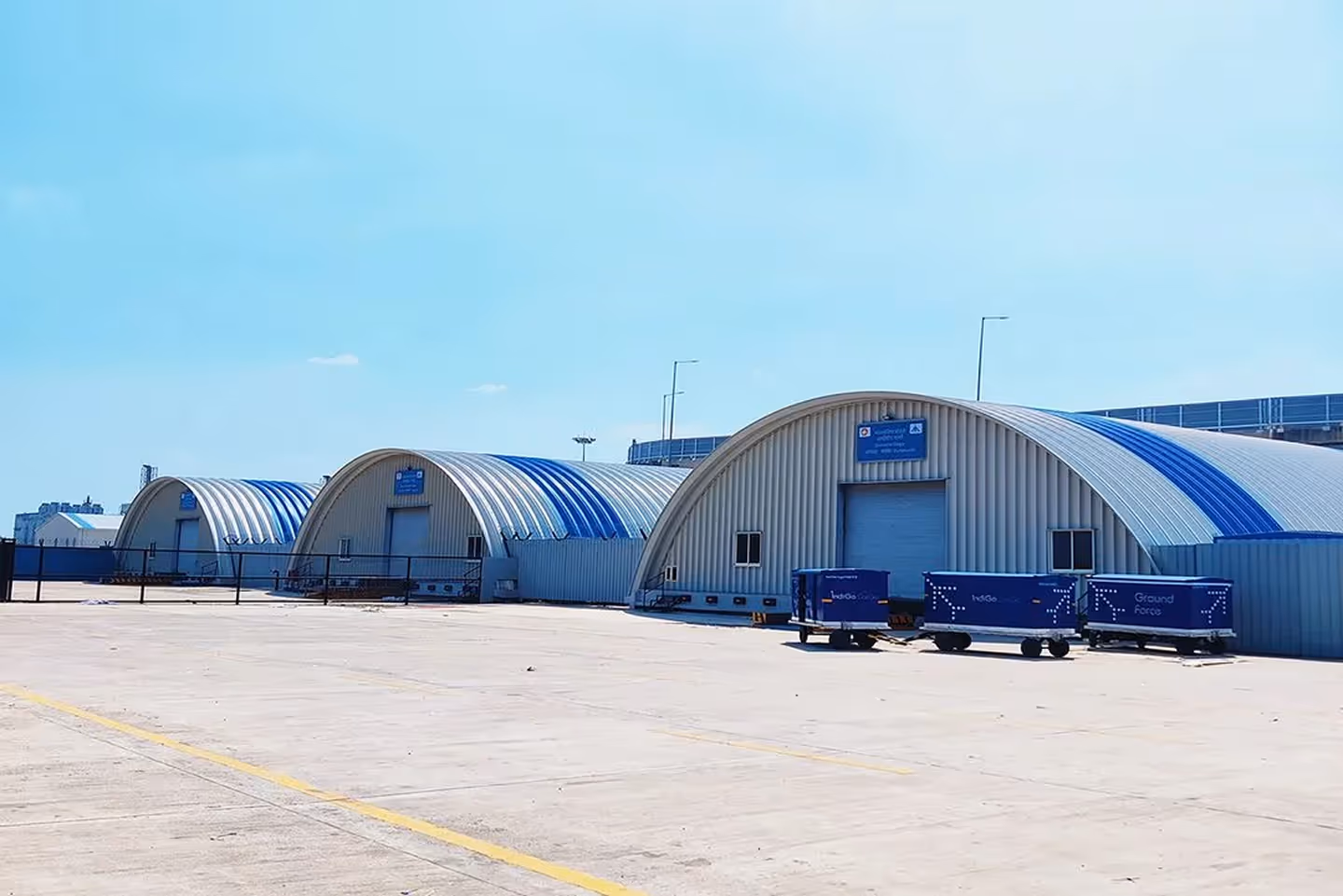 Corrugated steel roofing sheets for ground-to-ground structure by Proflex