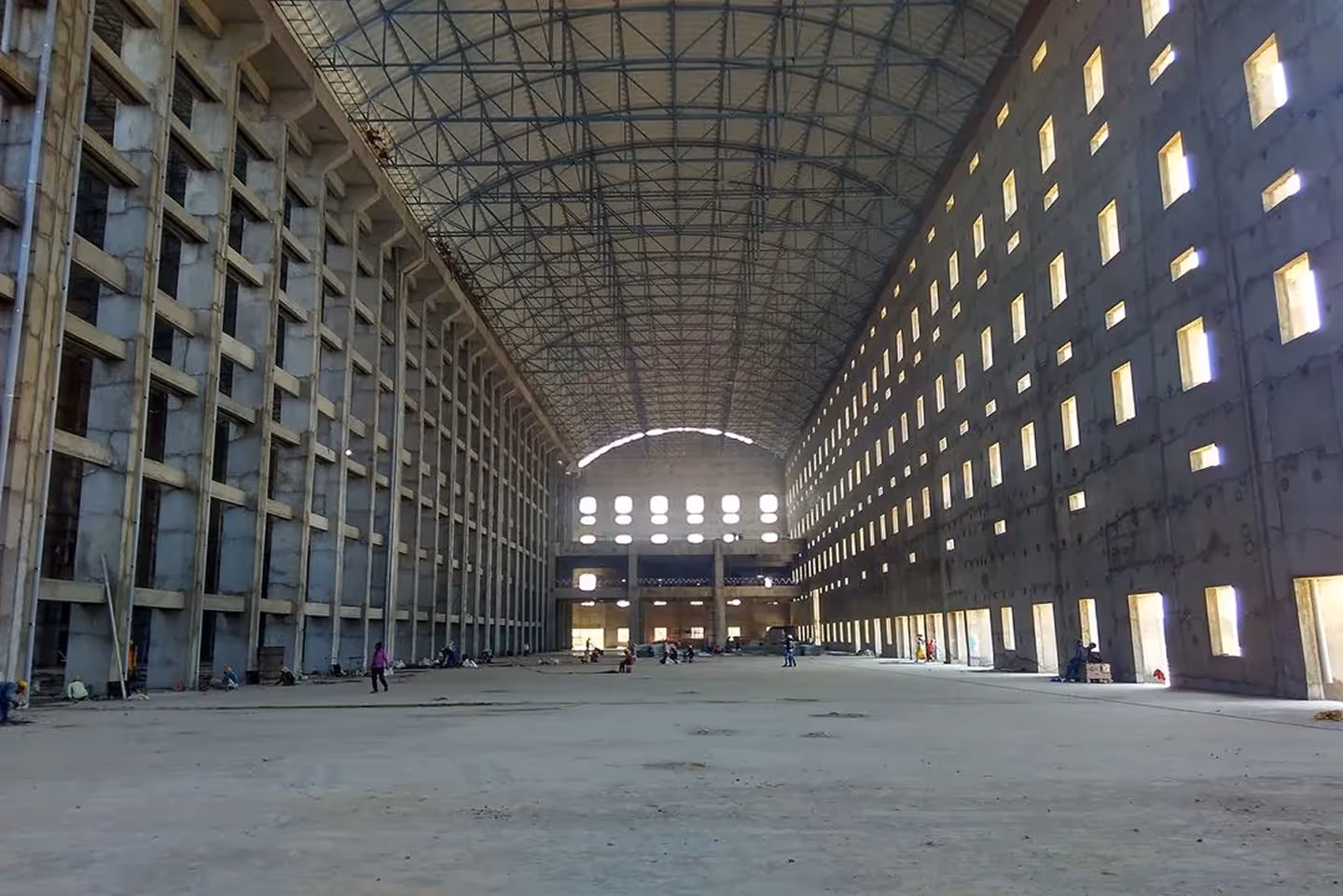 Proflex arch-shaped steel roofing on an industrial warehouse in India