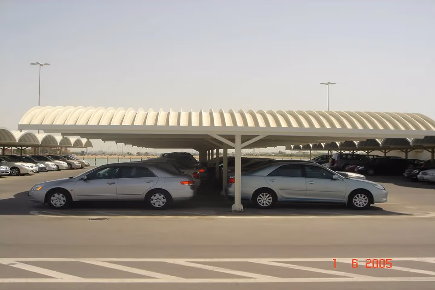 Corrugated steel roofing for parking bay by Indian roofing company