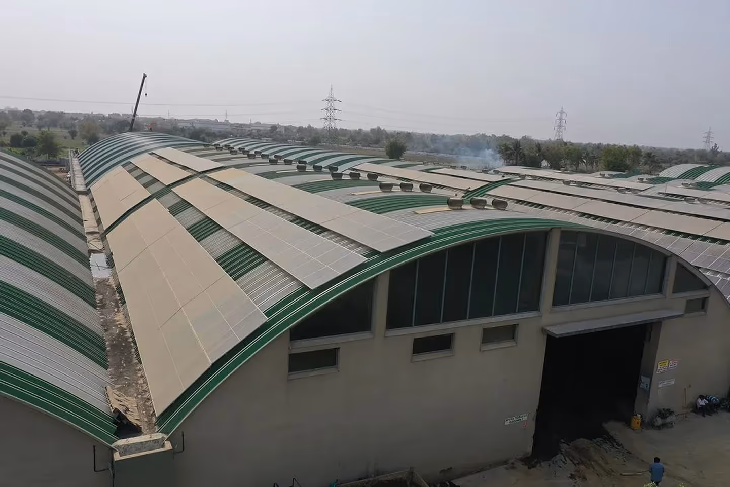 Arch-shaped Proflex roofing with solar panels in India