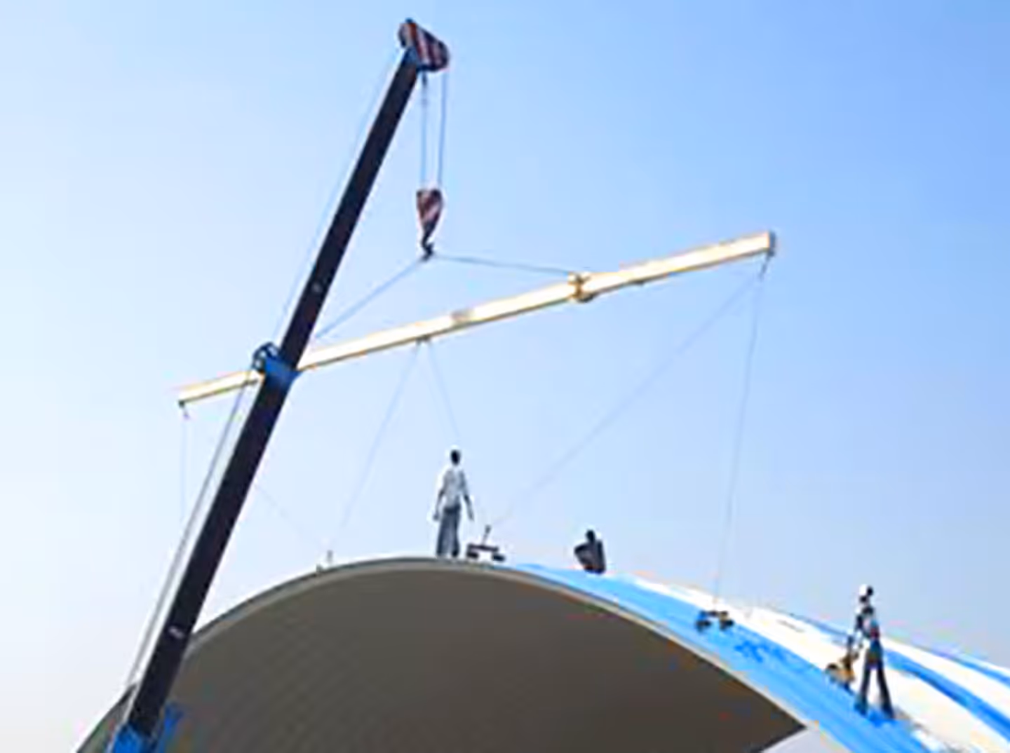 Top seaming process for Proflex self-supported arch roofing in India