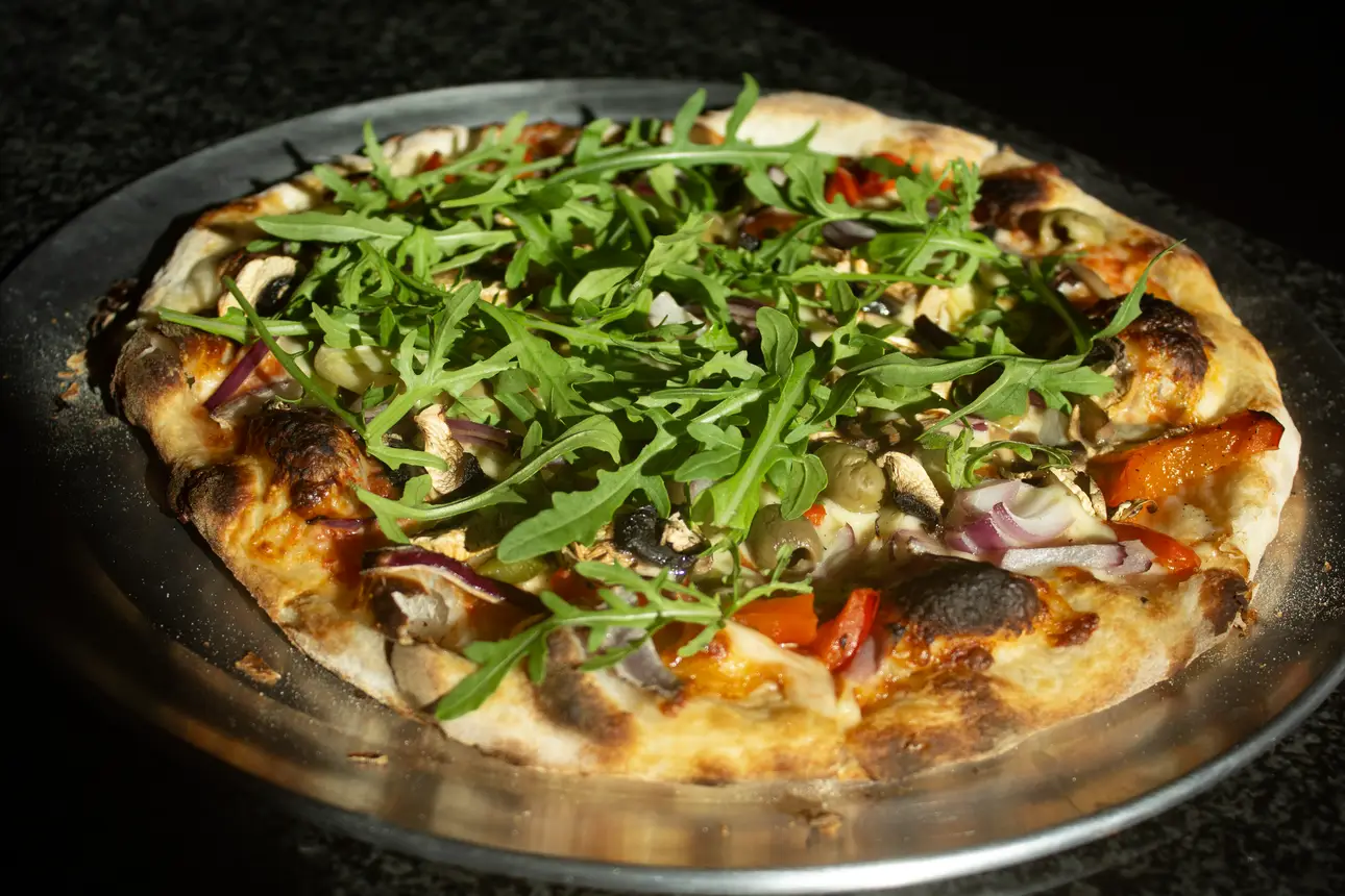 Homemade, wood fried pizzas. A local community favourite dish using all fresh ingredients at The Sportsman, Bishopston, Bristol