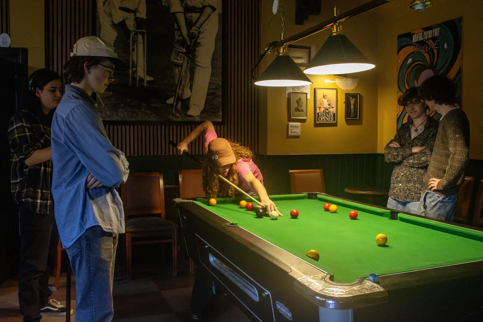 Enjoy drinks and pool with friends in our cosy, centuries-old pub, featuring a striking image of W.G. Grace