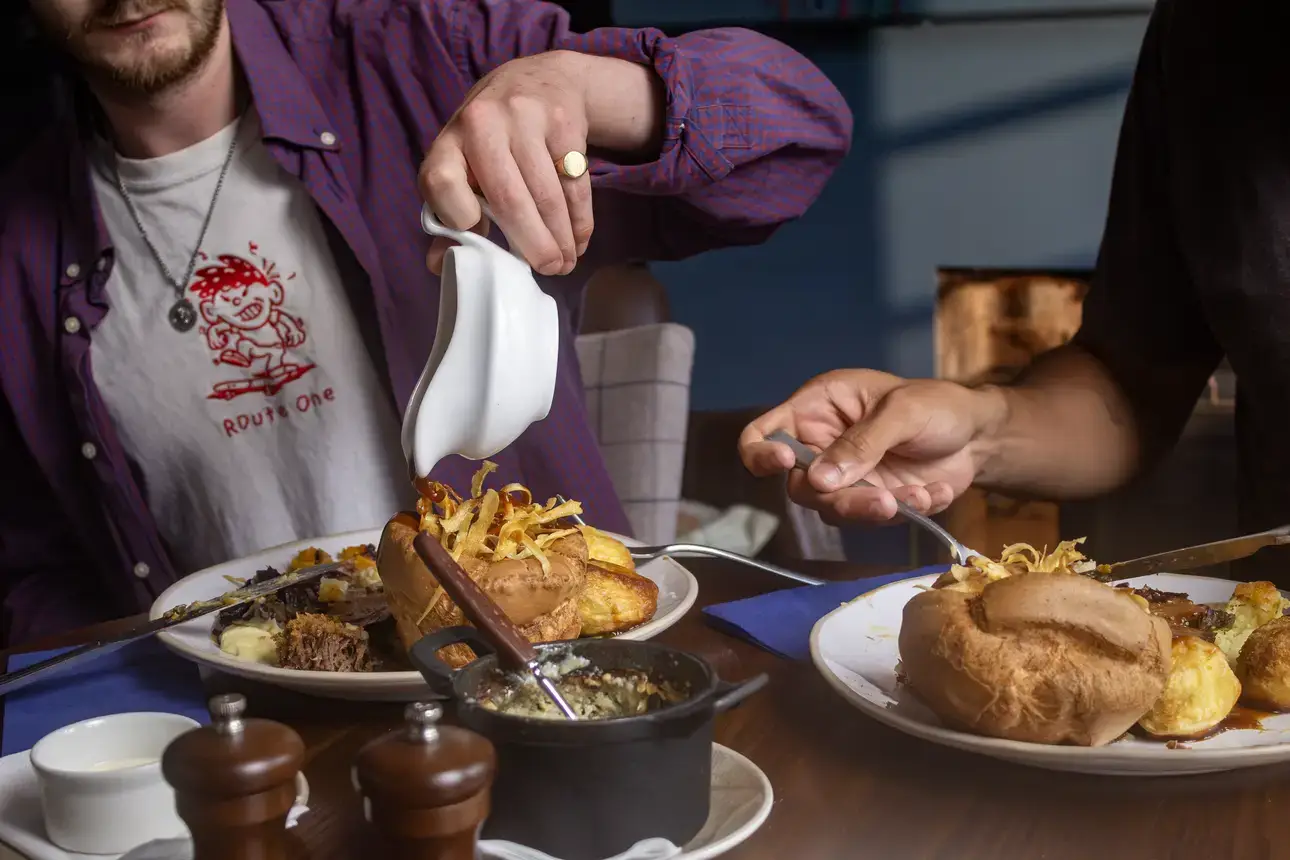 Join friends and family for a classic roast dinner, cozy atmosphere, and great drinks in the heart of the Star and Dove, Totterdown, Bristol