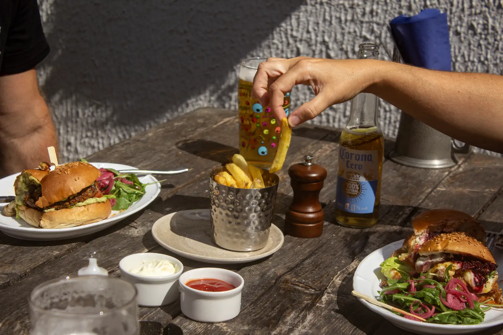 Friends and family sharing a meal from a menu with a with range of products to suite all tastes. 