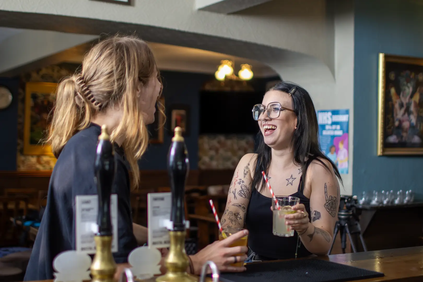 Friendly vibes at a pub in Kingsdown, Bristol. Locals enjoy drinks, laughter, and good company in a welcoming community setting.