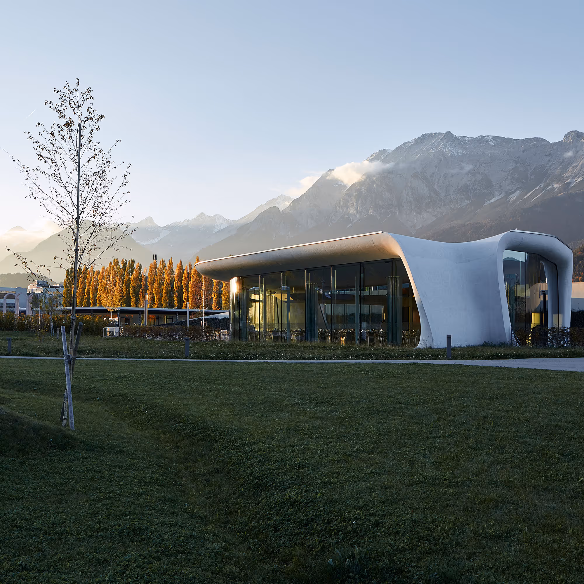 Architecturally impressive Daniels Kristallwelten by DoN restaurant in Wattens, nestled in the Tyrolean mountain landscape.