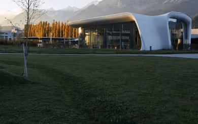 Architecturally impressive Daniels Kristallwelten by DoN restaurant in Wattens, nestled in the Tyrolean mountain landscape.