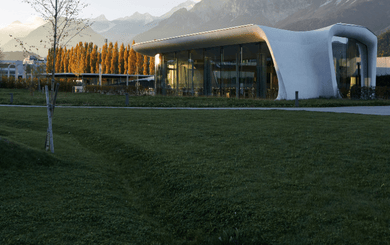 Architecturally impressive Daniels Kristallwelten by DoN restaurant in Wattens, nestled in the Tyrolean mountain landscape.