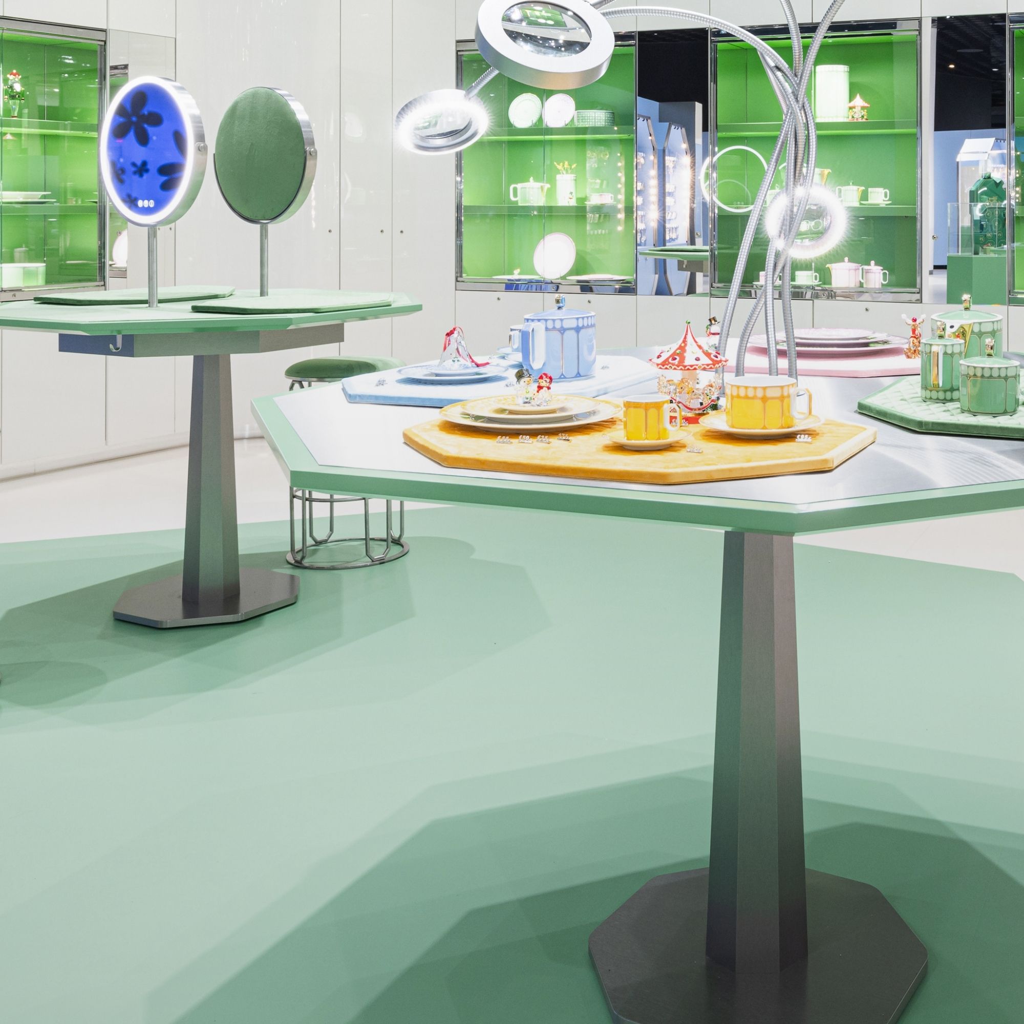 Interior view of the Swarovski Kristallwelten Store Wattens with colorful display cabinets and modern jewelry presentations in pastel color displays.