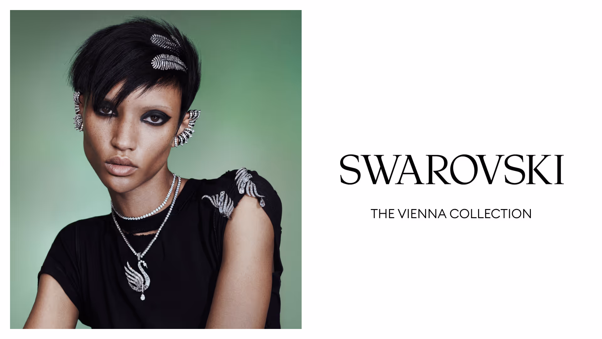 Model wears sparkling jewelry from the Swarovski Vienna Collection — eye-catching earrings, necklaces and brooches with crystal details, presented against a green background with the Swarovski logo.