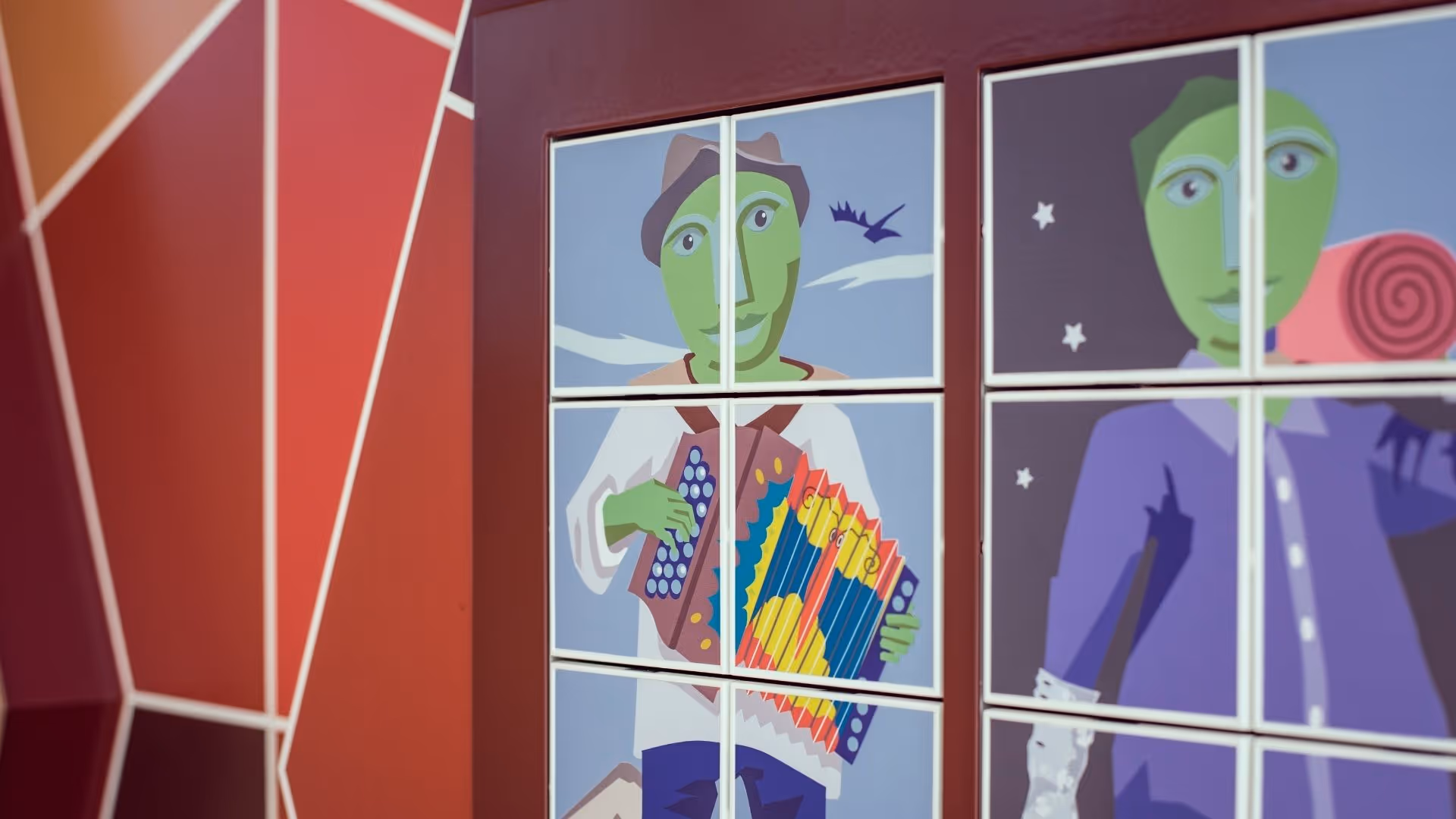 Game module in the play tower at Swarovski Kristallwelten: A colorful sliding puzzle with illustrations of the iconic giant, developed in cooperation with Ravensburger.