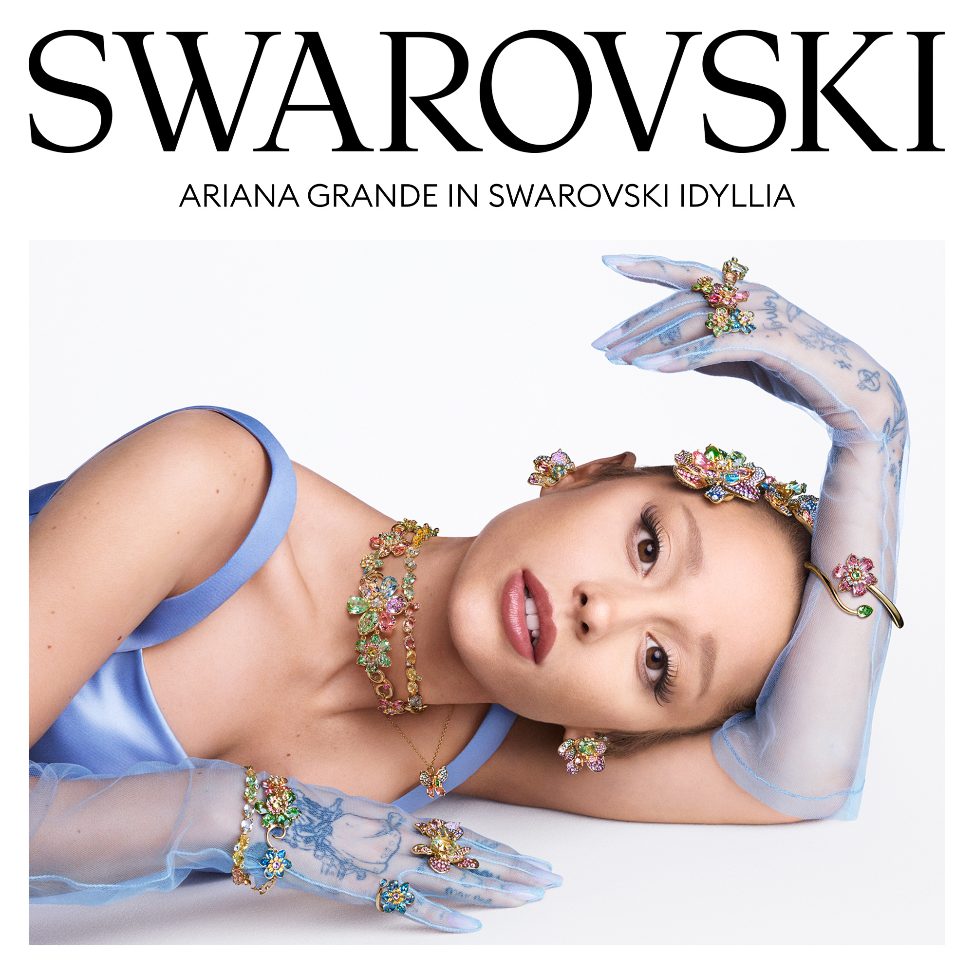 Ariana Grande in the Swarovski Idyllia collection — glamorous portrait with colorful jewelry: necklaces, rings, bracelets and earrings in floral designs.