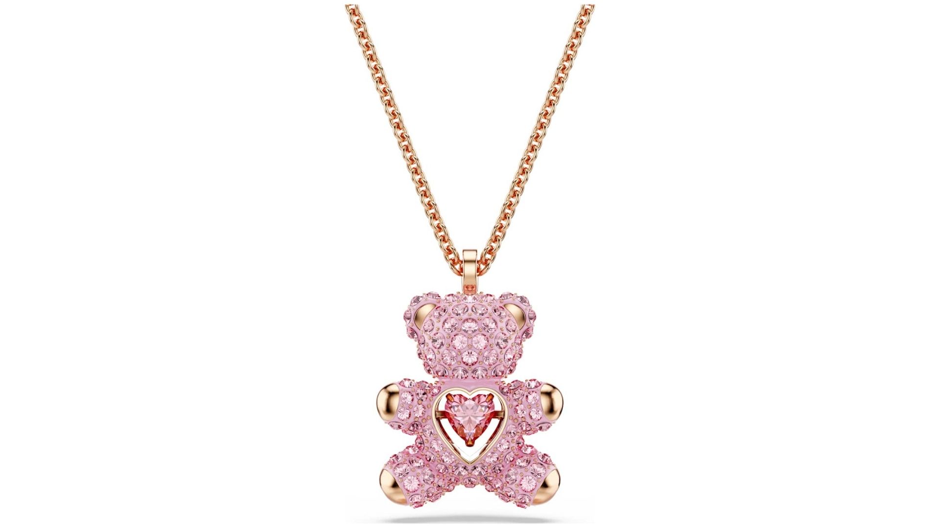 Rosévergoldete Swarovski Halskette mit einem pinken Kristall-Teddybär-Anhänger und einem Herzmotiv in der Mitte.