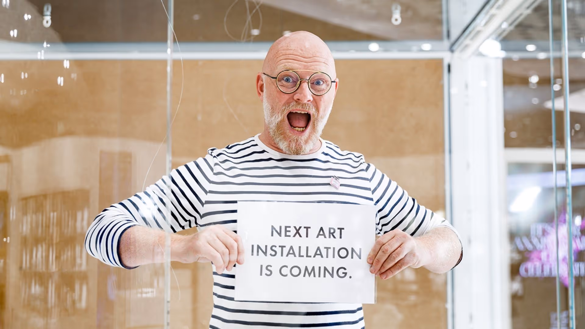 With a big smile, Marcel van Doorn announces the next art installation at Swarovski Kristallwelten Stores.