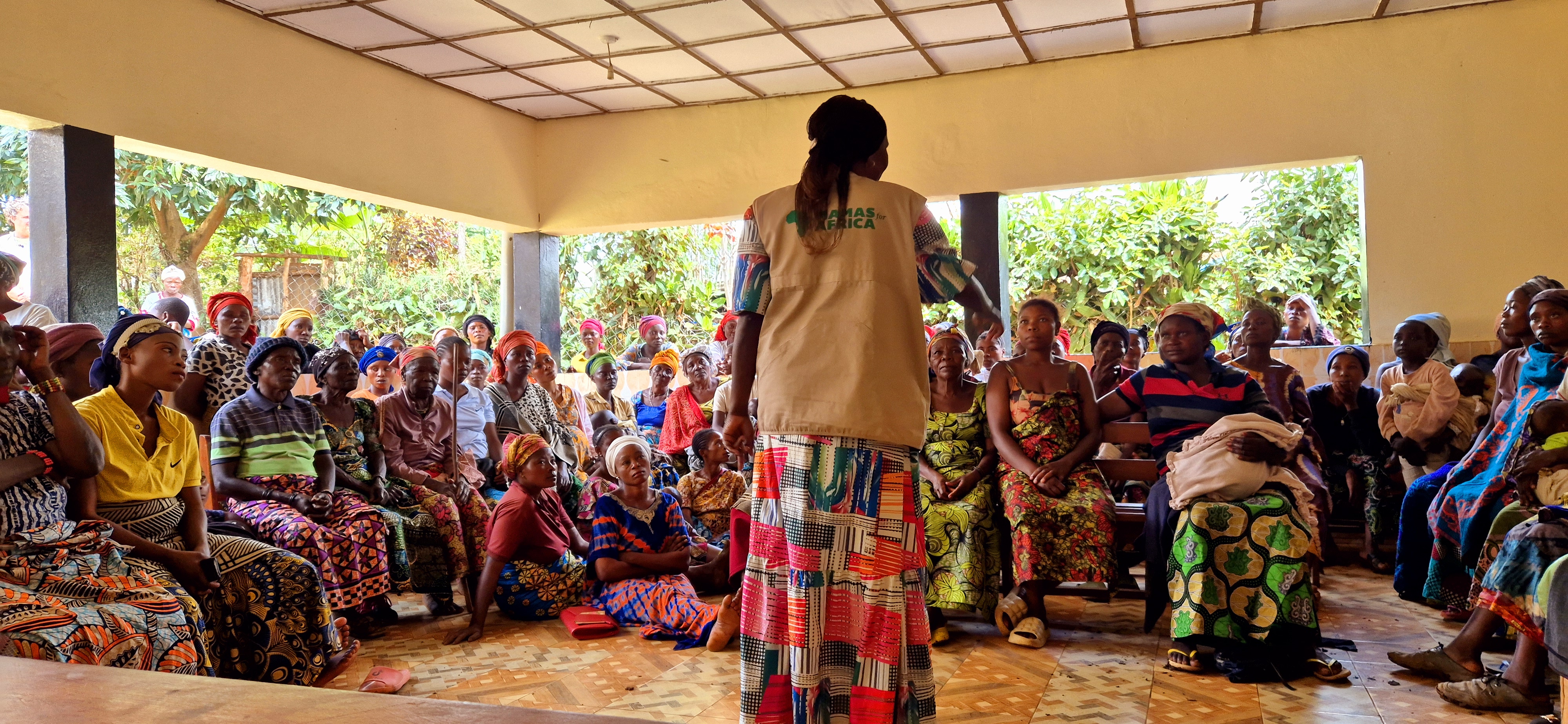 Women talking to a group of women