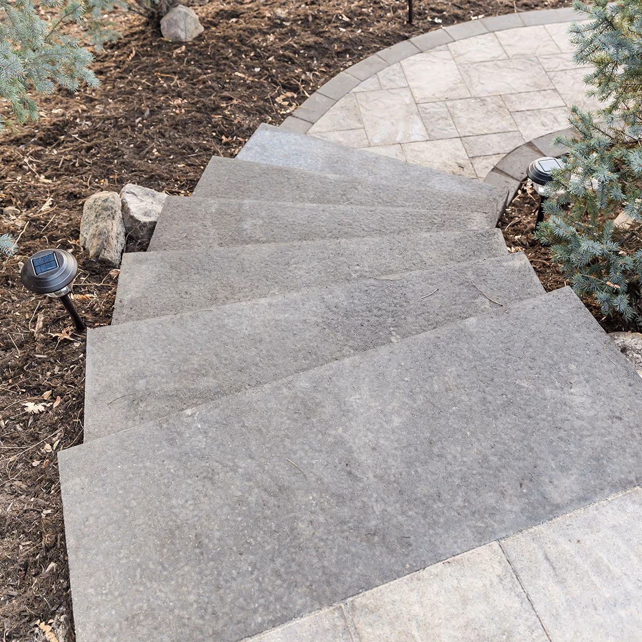 Front Range Outdoor Solutions custom paver patio installation in Windsor CO