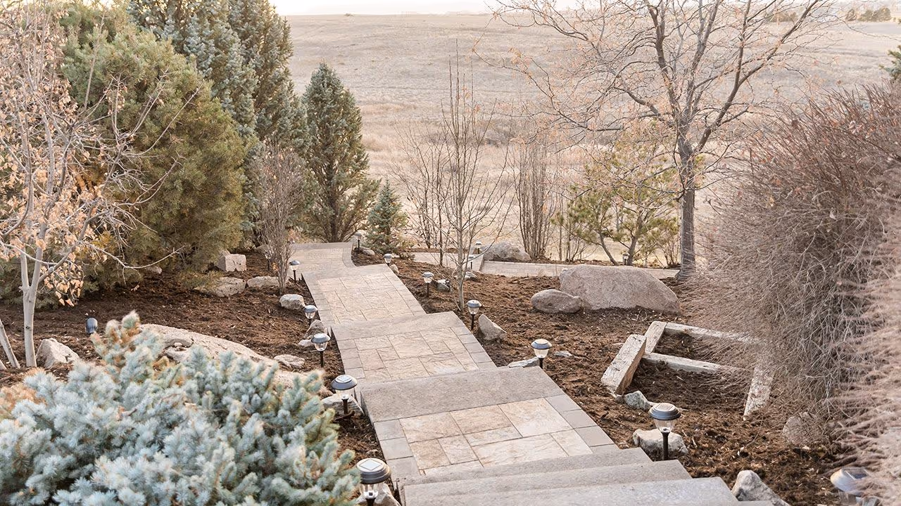 Outdoor living stone pathway and garden edging by Front Range Outdoor Solutions