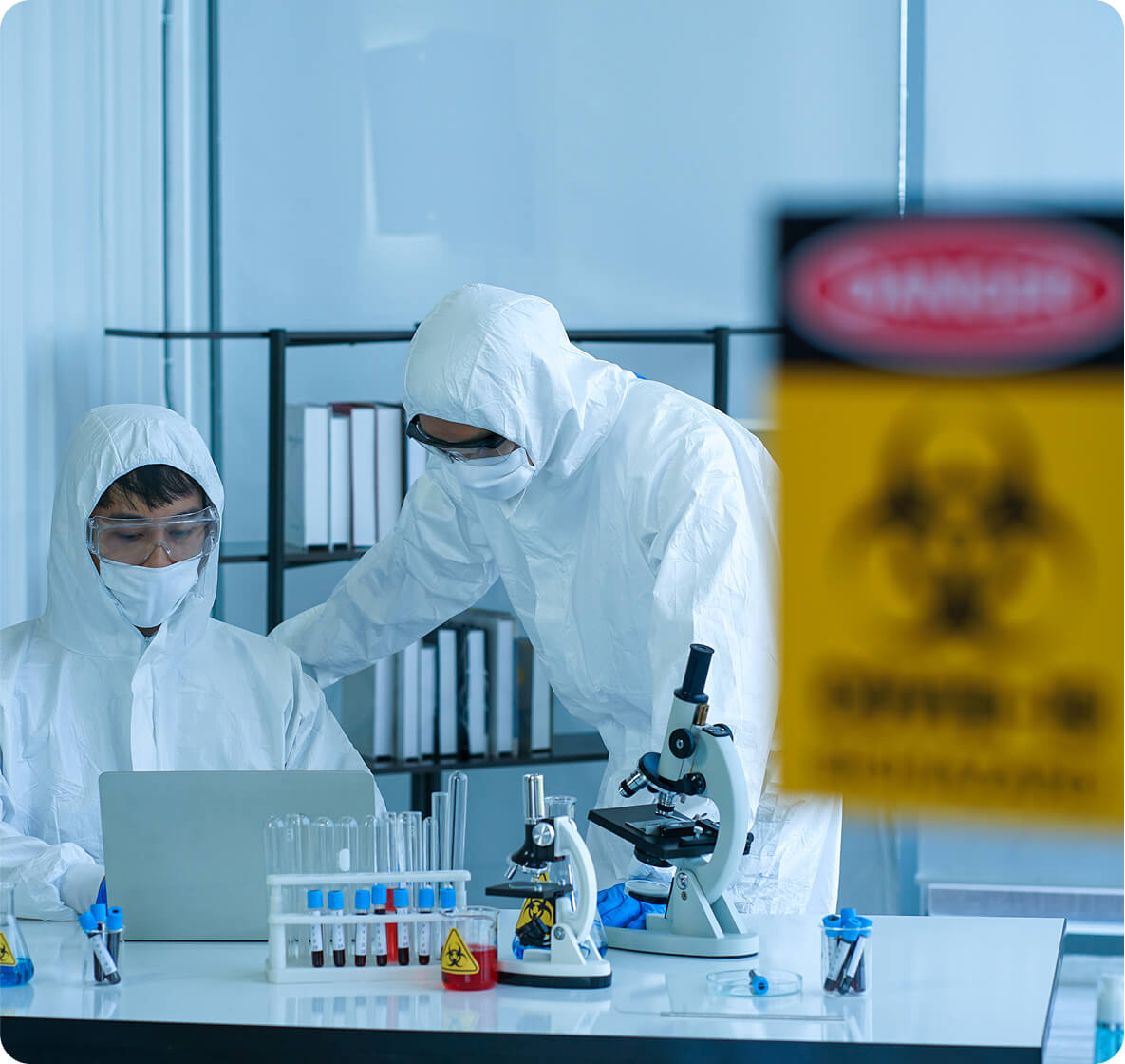 A scientist taping an iPad