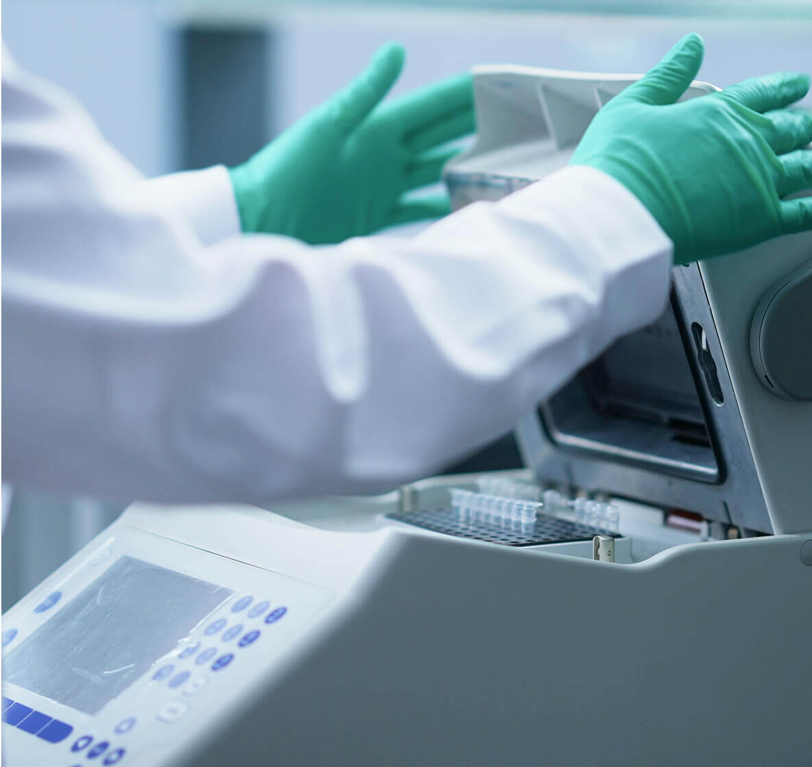 A scientist taping an iPad