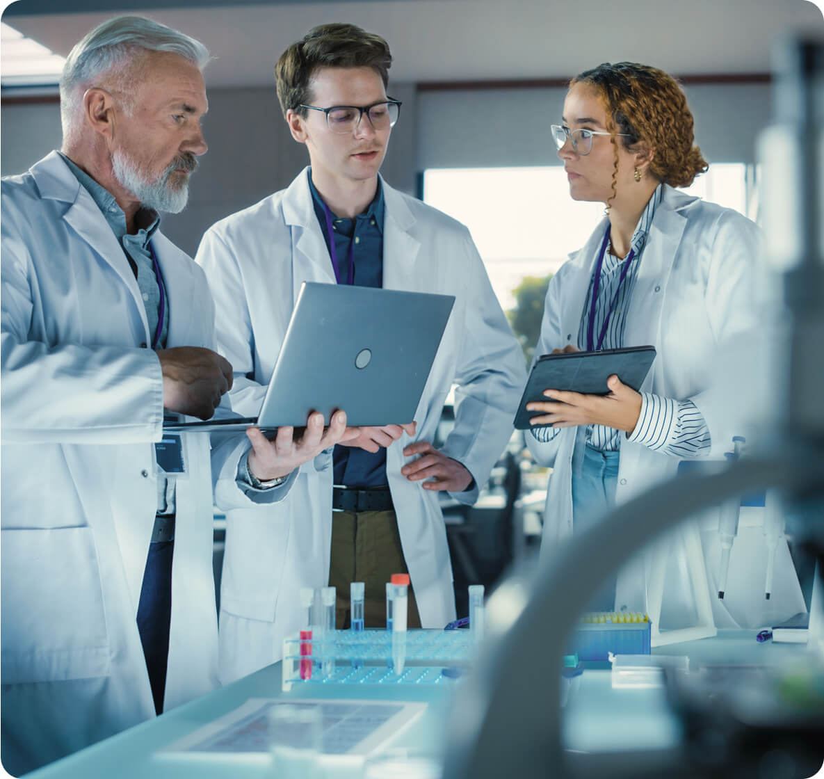 A scientist taping an iPad