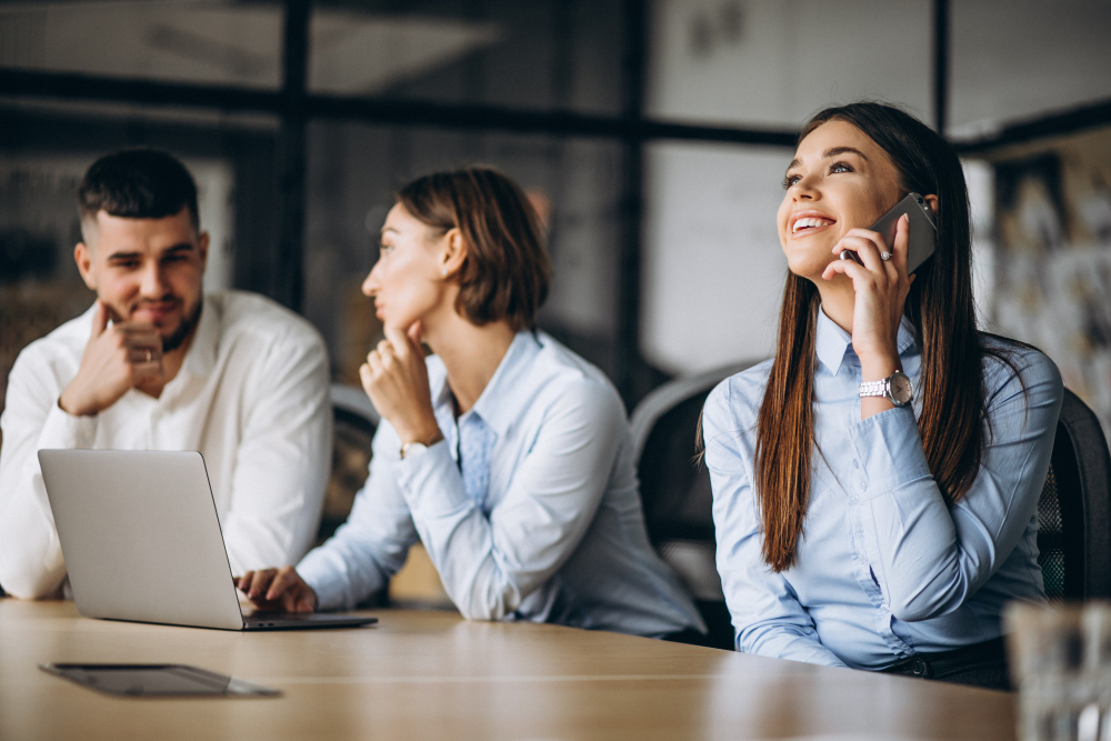 employees having a meeting - Workflow Automation for Small Business