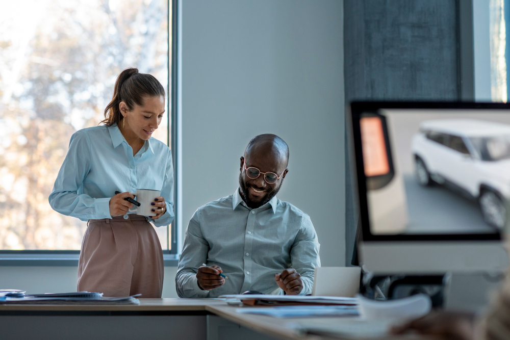 employees having a discussion - What Is an AI Agency