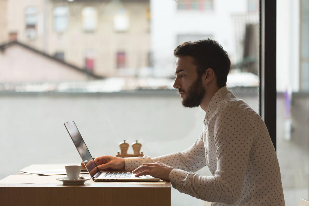 man using a laptop - How to Automate My Business