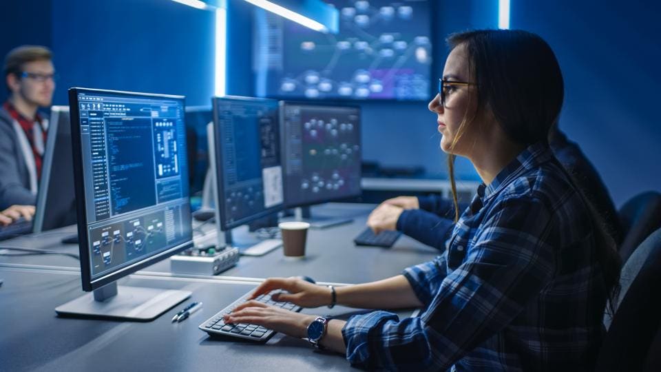 woman using a computer - Intelligent Agent Examples