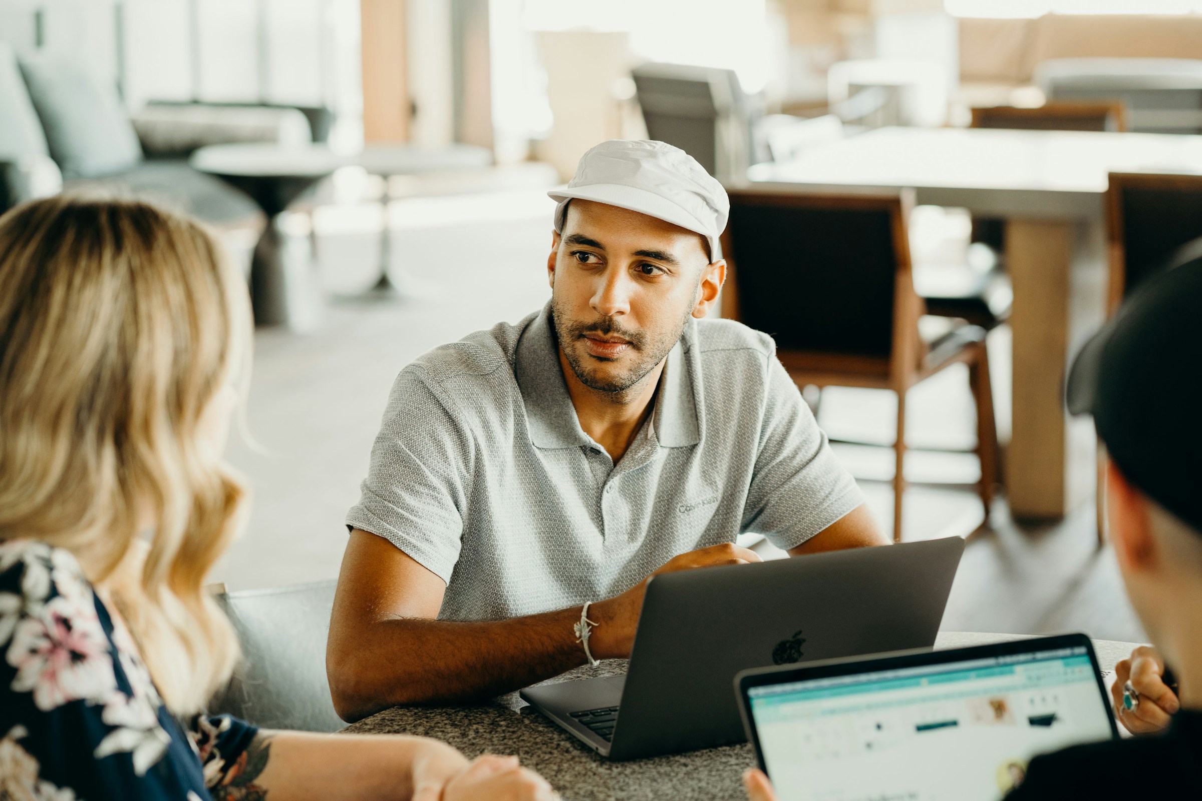 man wearing a cap - AI Consulting for Small Businesses