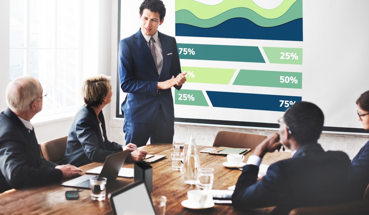 employees in a meeting - Best AI Tools for Business Analyst