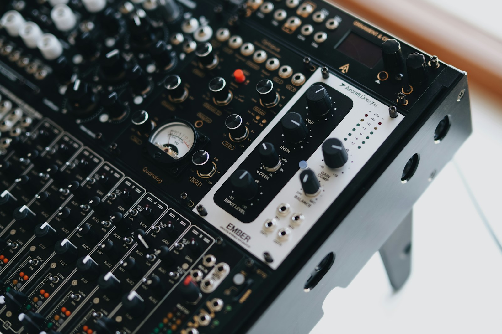 Controls and knobs of a professional audio mixing console
