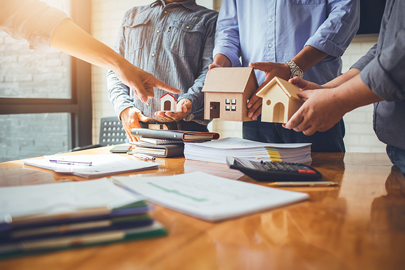 Florida real estate investor reviewing LLC and trust documents for asset protection
