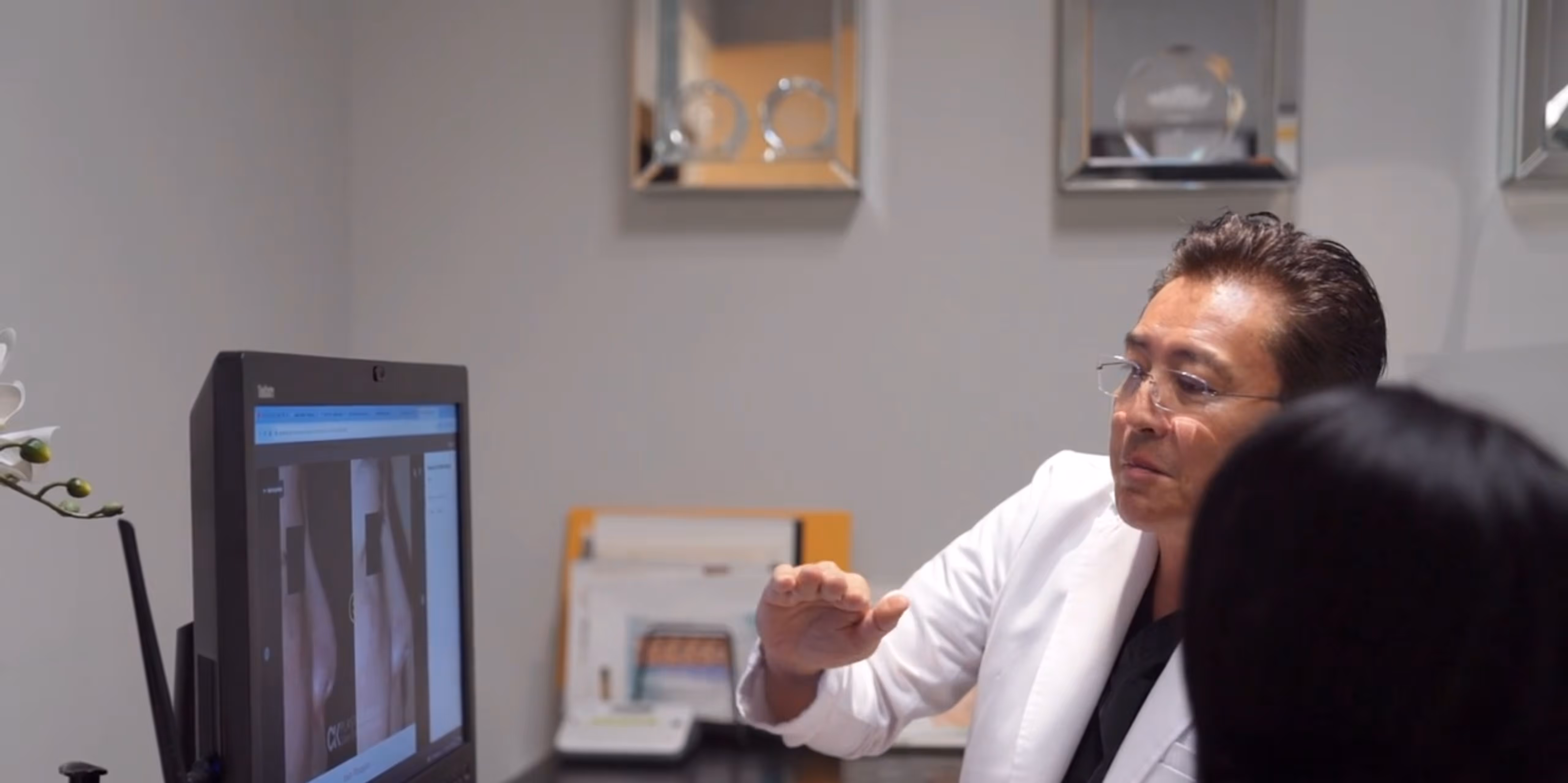 Doctor Kim giving consultation to engaged patient at CK Plastic Surgery, Asian Clinic