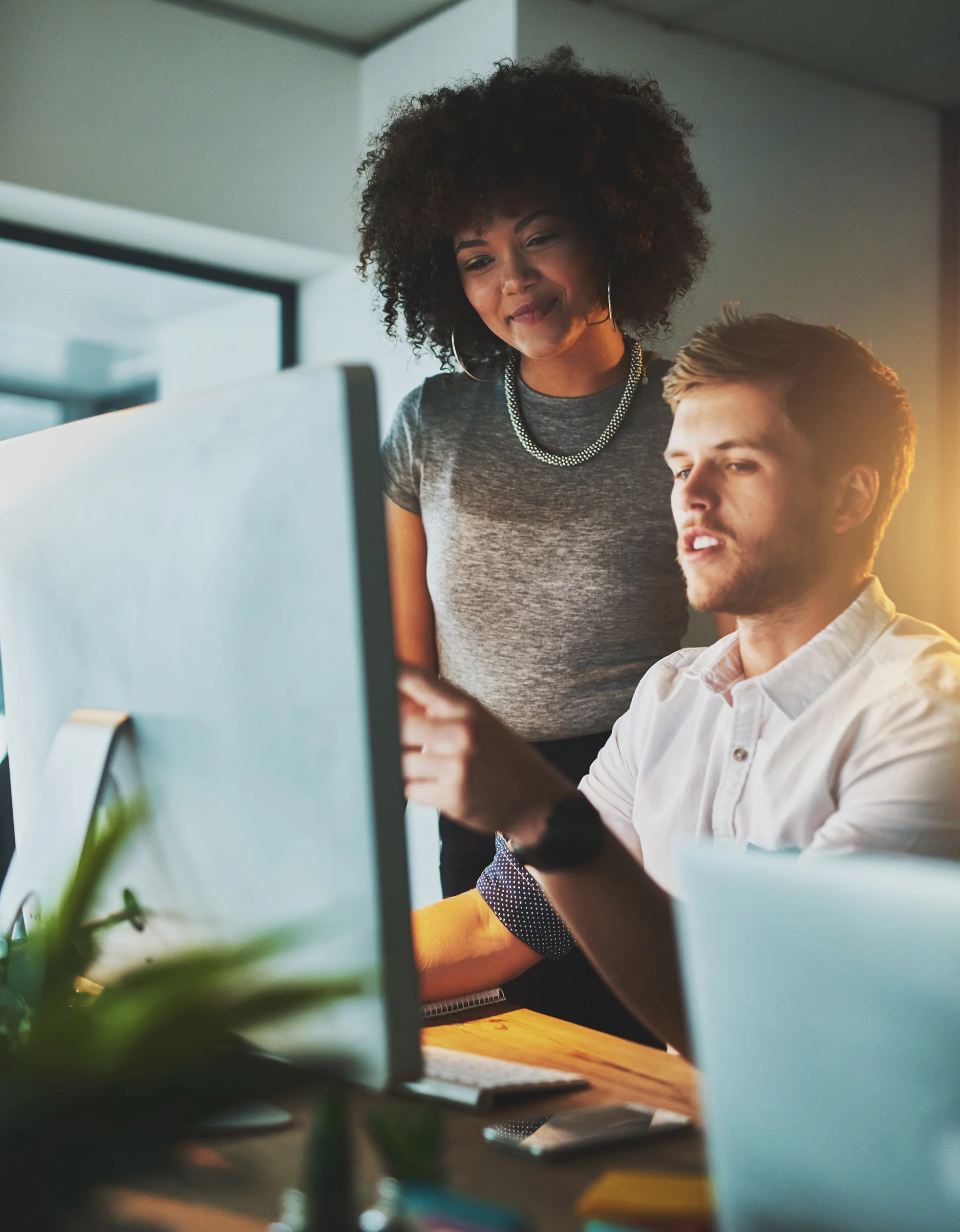 Commercial and marketing team analyzing healthcare data at a workstation