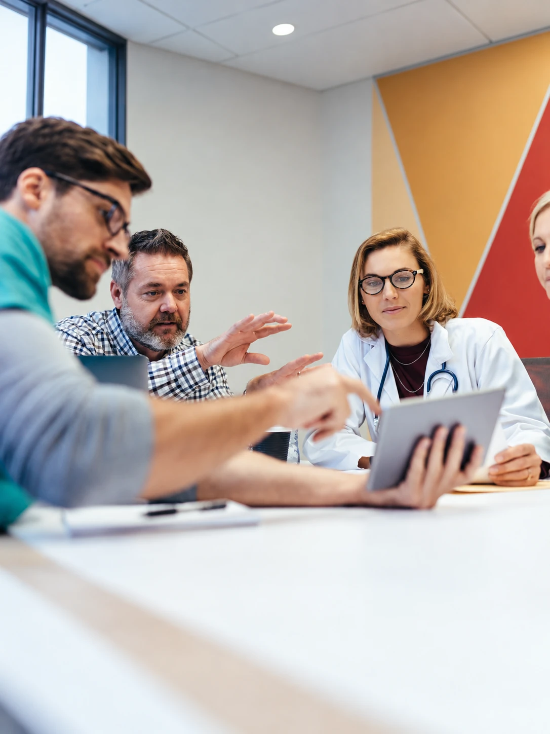 Healthtech commercial leadership team reviewing strategy