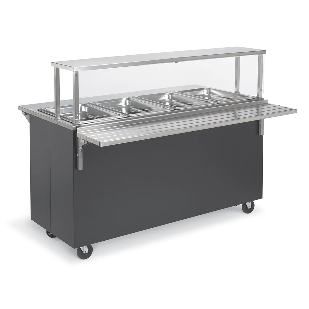Mobile stainless steel serving line with four food pans and a protective sneeze guard on a grey base with wheels.
