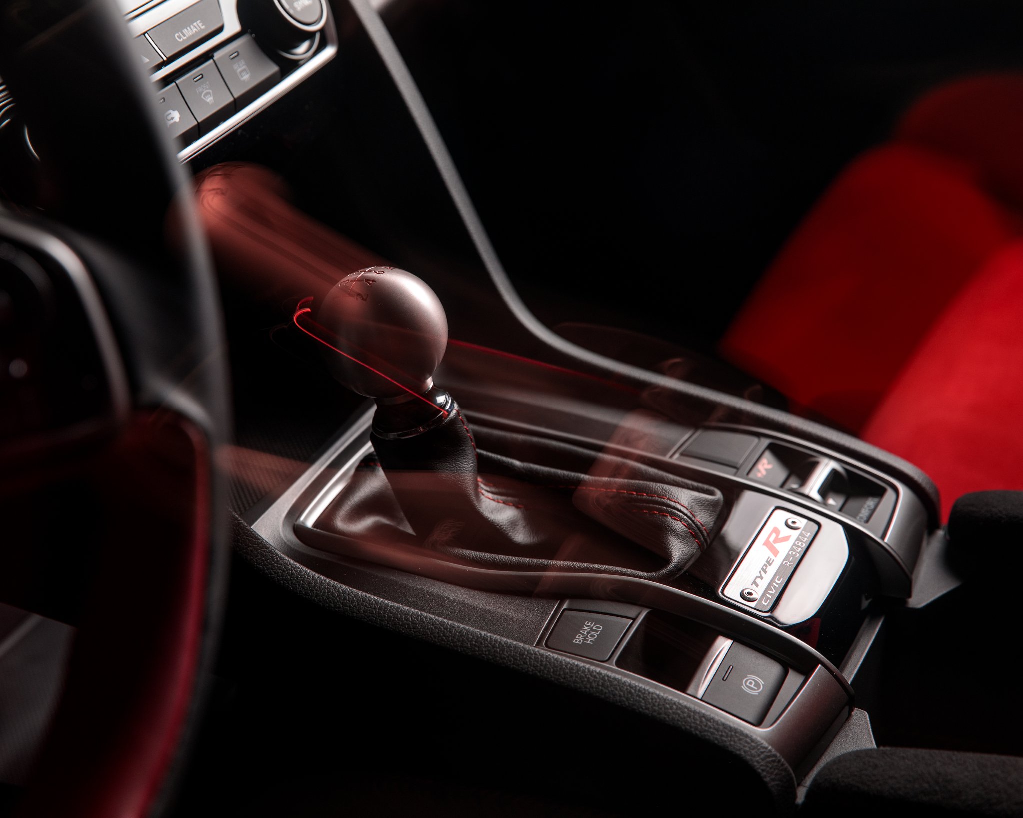 Honda CIvic Type R gear shift with a glowing motion blur