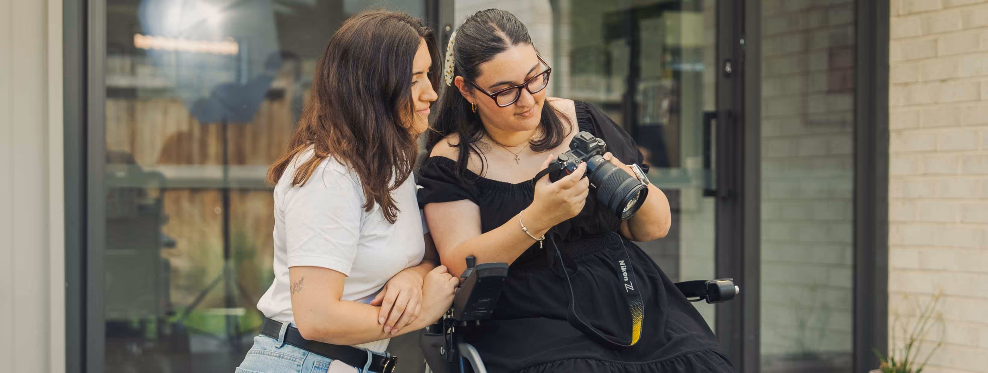CPSN client Michaela, a professional photographer with her Client Coordinator, Olivia at the CPSN shoot day.